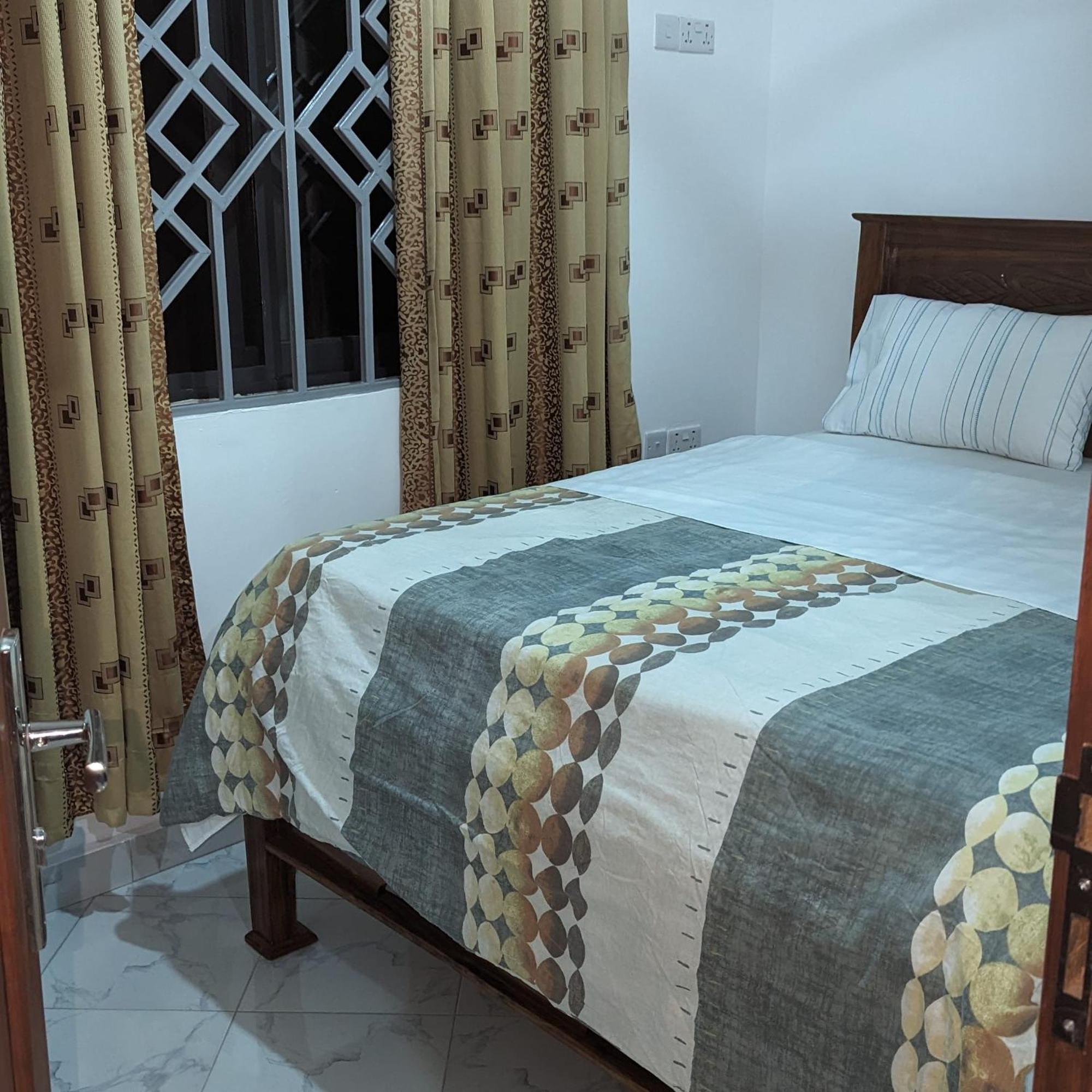 Mufasa City Hostel And Apartments Arusha Esterno foto